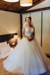 Fototapeta na wymiar Bride in white wedding dress .