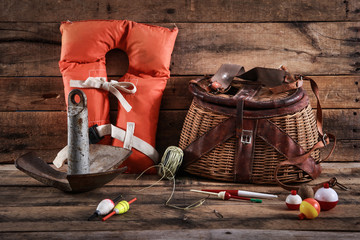 Anchor, Lifevest and fishing tackle with Creel
