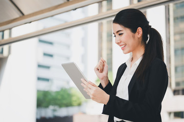 Business woman using tablet