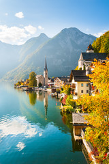 Famous Hallstatt village in Alps mountains, Austria. Beautiful autumn landscape - obrazy, fototapety, plakaty