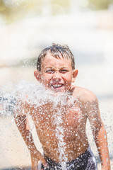 Smiling boy at a waterpark