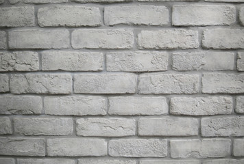 Modern white grey brick wall textured background.