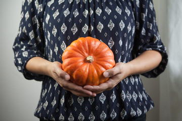 Woman holding Squash, Thanksgiving