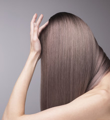 Elegant anonymous shot of perfect purple hair after salon care.