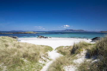 Fototapeta na wymiar Sand dunes on the North Beach of the Isle of Iona, Scotland, UK, on a sunny day