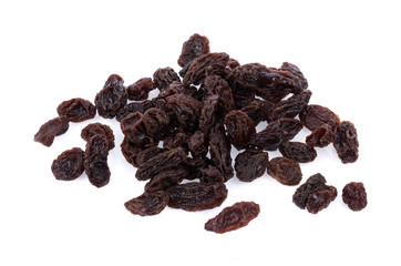 Dried raisins on white background