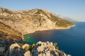 View of the shores of the Adriatic Sea and the Biokovo Mountains in the background in Croatia