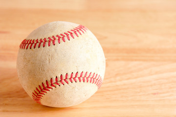 Sports Equipment old Baseball on wood background