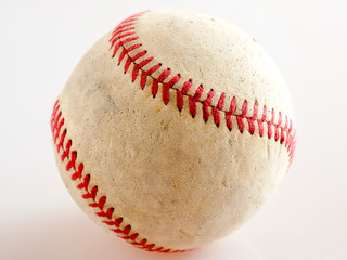 Sports Equipment old Baseball on white background