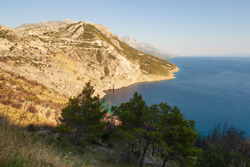 View of the shores of the Adriatic Sea and the Biokovo Mountains in the background in Croatia
