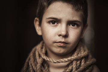 Heavy slave labor exploitation of children, heavy tired look of hopelessness