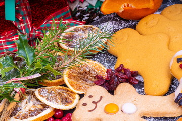 Festive Gingerbread Characters.  Selection of festive decorated Christmas Gingerbread characters surrounded by presents and gifts.