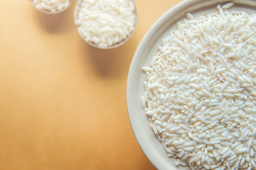 Background and wallpaper by pile of paddy rice and rice seed.