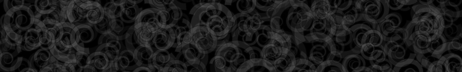 Abstract horizontal banner or background of randomly distributed translucent spirals with outlines in black and gray colors.