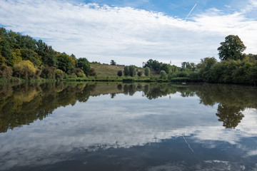 Fototapeta na wymiar Landscape reflection in lake