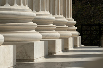 Columns United States Supreme Court building located in Washington, D.C., USA.