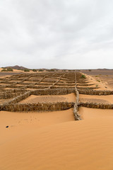 Naklejka premium Sand trap in the desert in Morocco