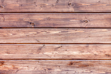 Fototapeta premium Horizontal wooden panels of dark wood for the background.