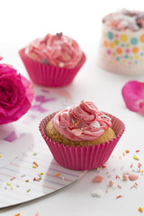 pink cupcakes on white background