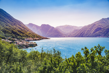 Lake Como in Italy. Landscape photography - Day scene, green trees and all villages on coastline. 