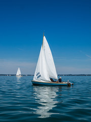 Sailing boat on a sunny day at a lake in Germany