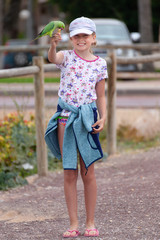Young girl with a parrot on the Canary Islands, Fuerteventura- Morro Jable