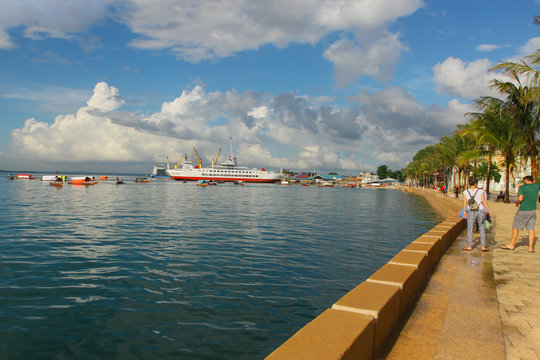 Morning on the waterfront/ View from the waterfront to the port of Zanzibar. In the distance you can see the pleasure boats and the ferry