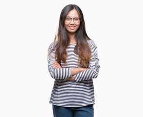 Young asian woman wearing glasses over isolated background happy face smiling with crossed arms looking at the camera. Positive person.