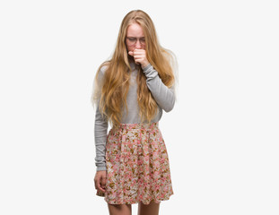 Blonde teenager woman wearing flowers skirt feeling unwell and coughing as symptom for cold or bronchitis. Healthcare concept.