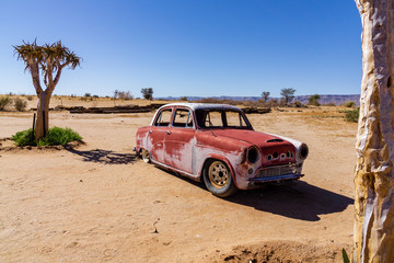 old rusty car in desert