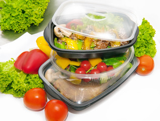 Chicken with lettuce and vegetables in lunchbox
