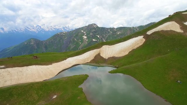 mountain lake and aerial view of peak