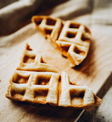 Toast with ham, cheese sandwich on a cutting board