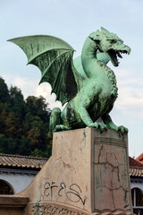 Dragon statue on the Dragon Bridge in Ljubljana, Slovenia. The bridge, decorated with the Dragon...