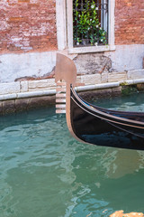 gondola in the narrow canals of Venice, Italy © k_samurkas