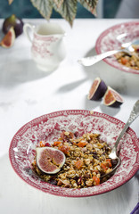 homemade granola with figs in a vintage plate