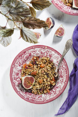 homemade granola with figs in a vintage plate