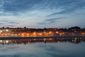 Fototapeta premium Night view of a beautiful town in the Cantabrian Sea