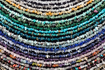 Assorted semi precious stone jewelry on display
