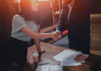 Estate agent with customer after contract signature. Handshake. Real Estate concept.