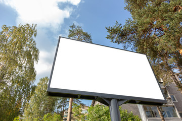 Blank advertising board on city street