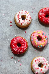 Homemade Colorful Frosted Mini Donuts or Cake Doughnuts  top view