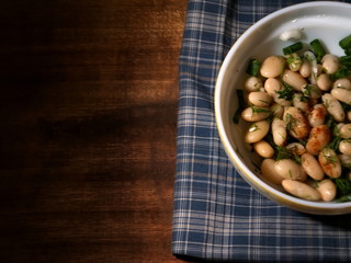 Salad from boiled string beans. Salad on the table.