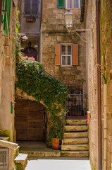 Old courtyard in Pitigliano, Italy