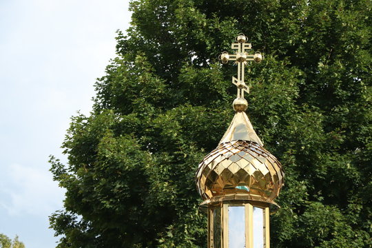 tower of the church with tree in backround
