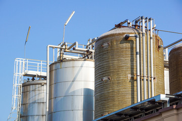 Stainless storage tanks in chemical industry . .metal detail