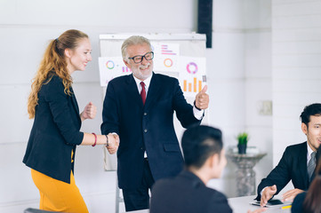 Manager welcome a new member for team strategy business.People of employeer sitting in a meeting and listen speaker present a new ideas to success