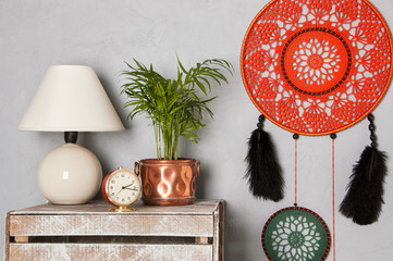 Dream catcher on gray background.