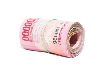 Roll of 100 000 IDR notes