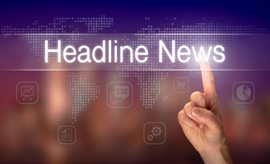 A hand selecting a Headline News business concept on a clear screen with a colorful blurred background.
